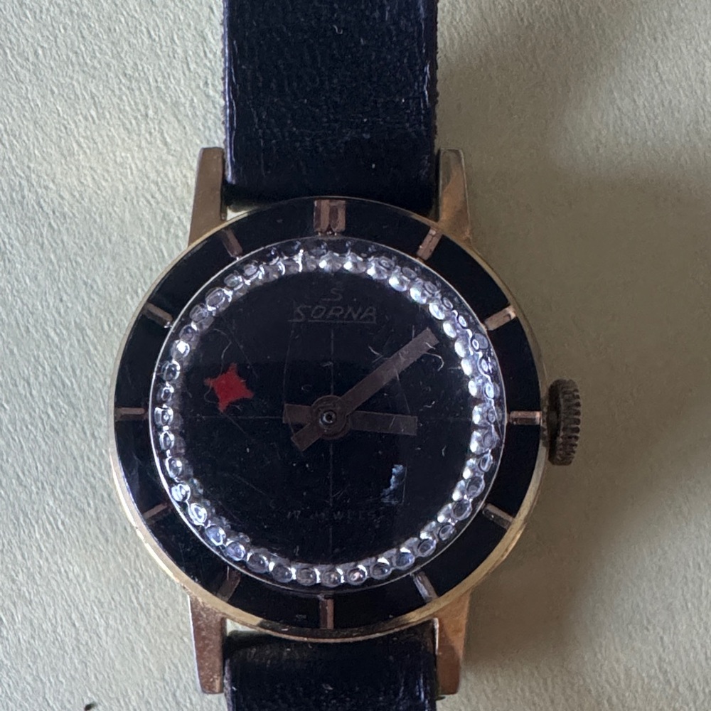 Sorna Swiss Made Black and Gold Watch
